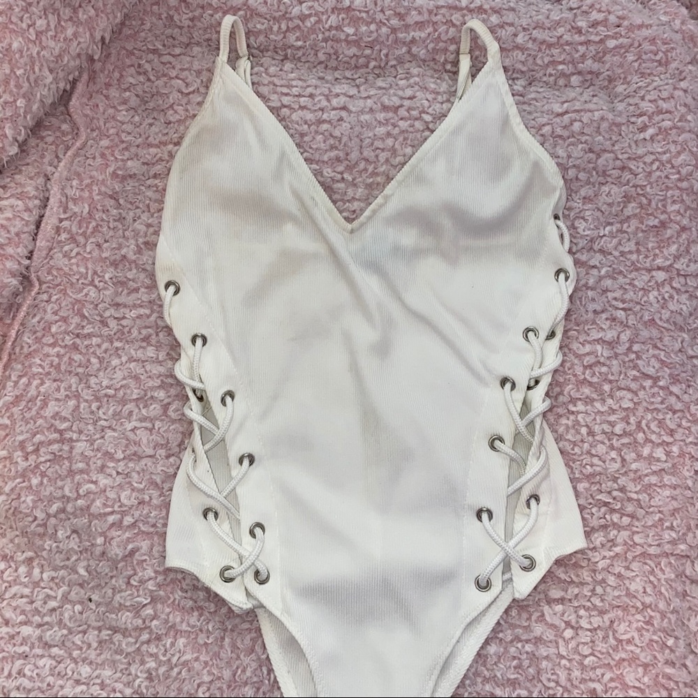 Ribbed lace up detail bodysuit.